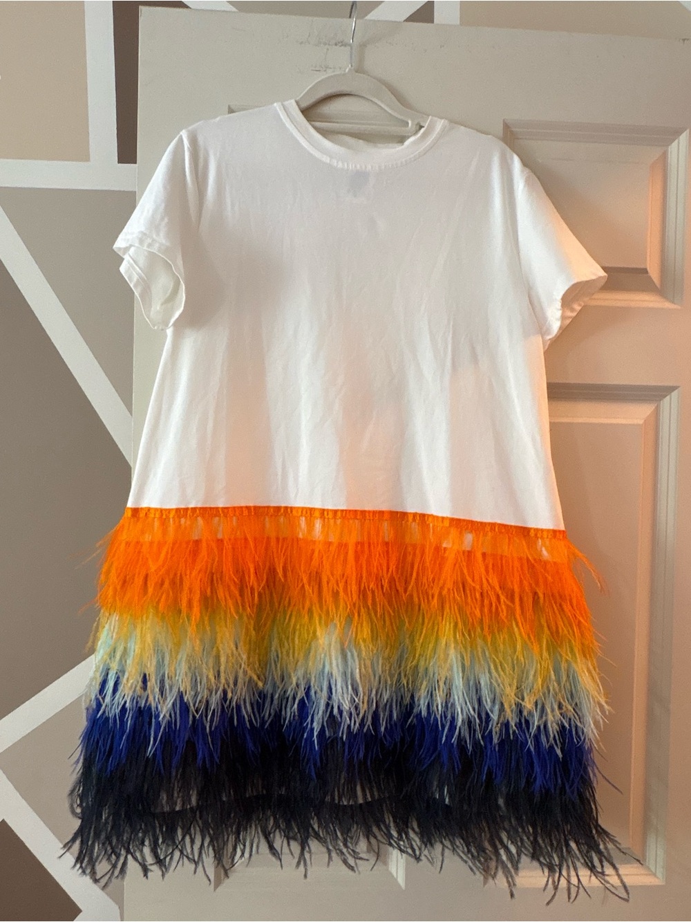 QUEEN OF SPARKLES White Tee Dress with Orange, Yellow & Blue Feather Trim